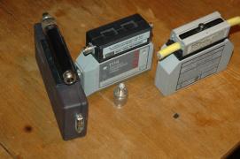 assorted thicknet transceivers: /3com (with SQE selectable),/2 x ISOLAN 1114 with different media adapters/note the adapter from the thicknet plug to the thinnet (RG58/BNC) plug assorted thicknet transceivers: /3com (with SQE selectable),/2 x ISOLAN 1114 with different media adapters/note the adapter from the thicknet plug to the thinnet (RG58/BNC) plug